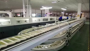 新华企业精密达高速胶装联动线投入试运行